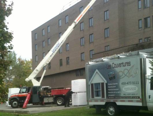 Image de travaux sur un toit plat immeuble