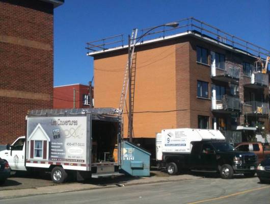 Image de travaux sur un toit plat immeuble